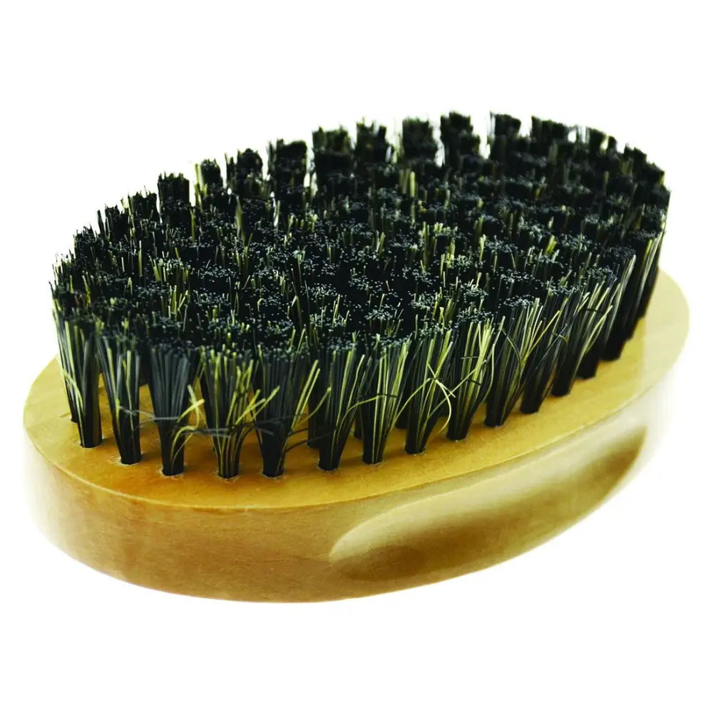 Wooden brush with black bristles on a white background