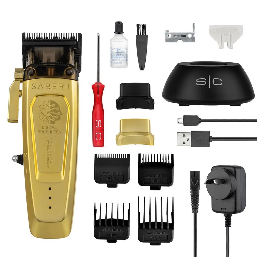 Gold hair trimmer set with attachments and accessories on a white background