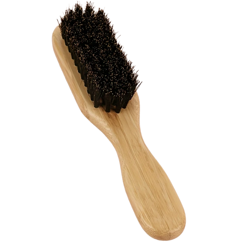 Wooden hairbrush with black bristles on a white background