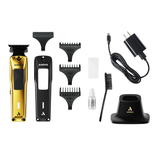 Andis grooming kit with trimmer, attachments, and accessories on a white background