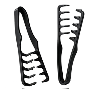 Two black hair styling tools on a white background