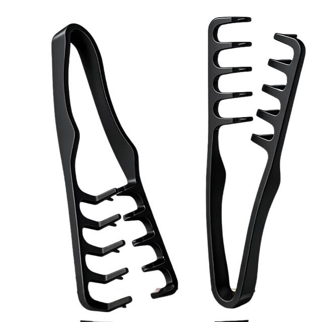 Two black hair styling tools on a white background