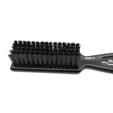 Black brush with bristles on a white background