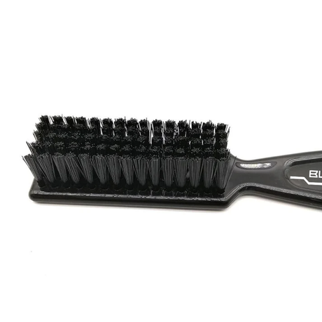 Black brush with bristles on a white background