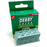 Box of Derby Extra razor blades with a stack of blades on a white background