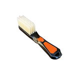 Brush with orange handle and white bristles on a white background