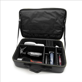 Black grooming case with hair cutting tools inside on a white background