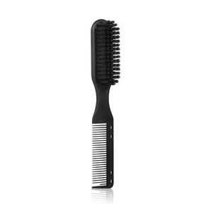 Black comb and brush on a white background