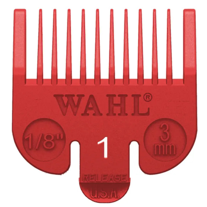 Red Wahl hair clipper comb with size markings on a white background